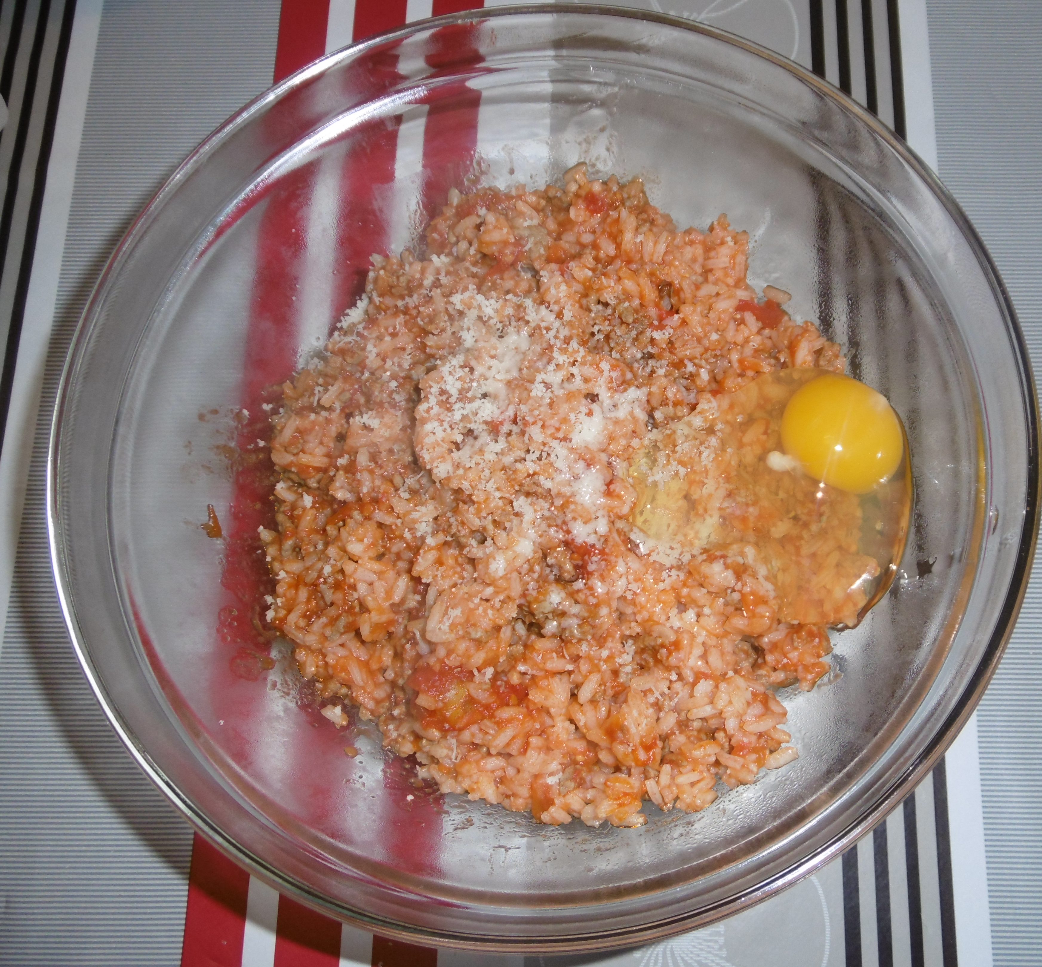 Timballo di riso al forno - Aggiunta parmigiano e uovo